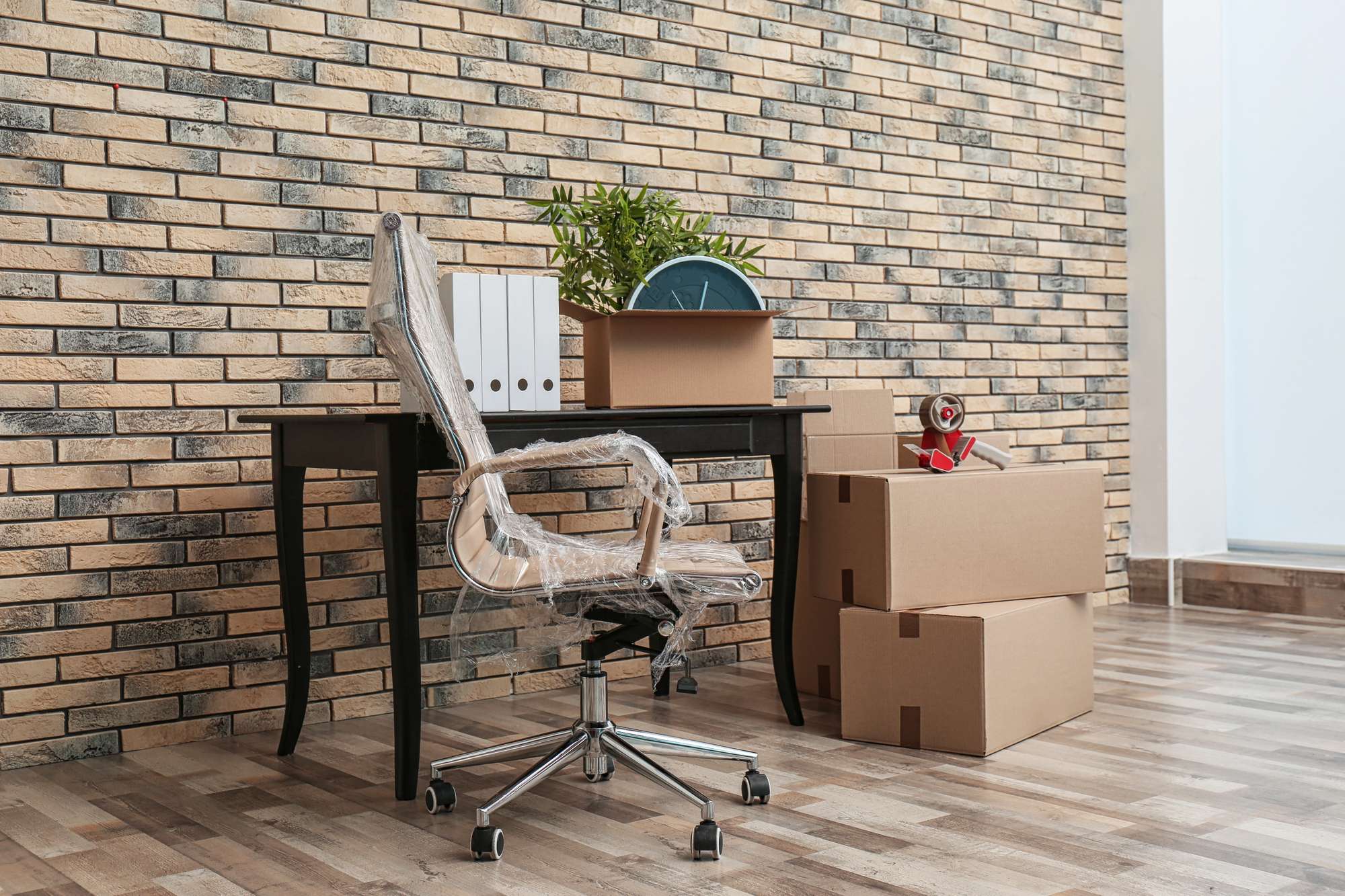 Table and Office chair covered in bubble wrap